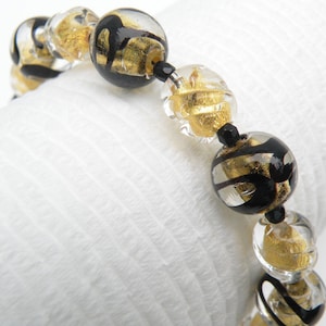 Murano Glass, Venetian Bead Bracelet with 8mm Baroque Round Melons and 12mm Round Black Swirls, with 24 Karat Gold Foil, Gold Clasp