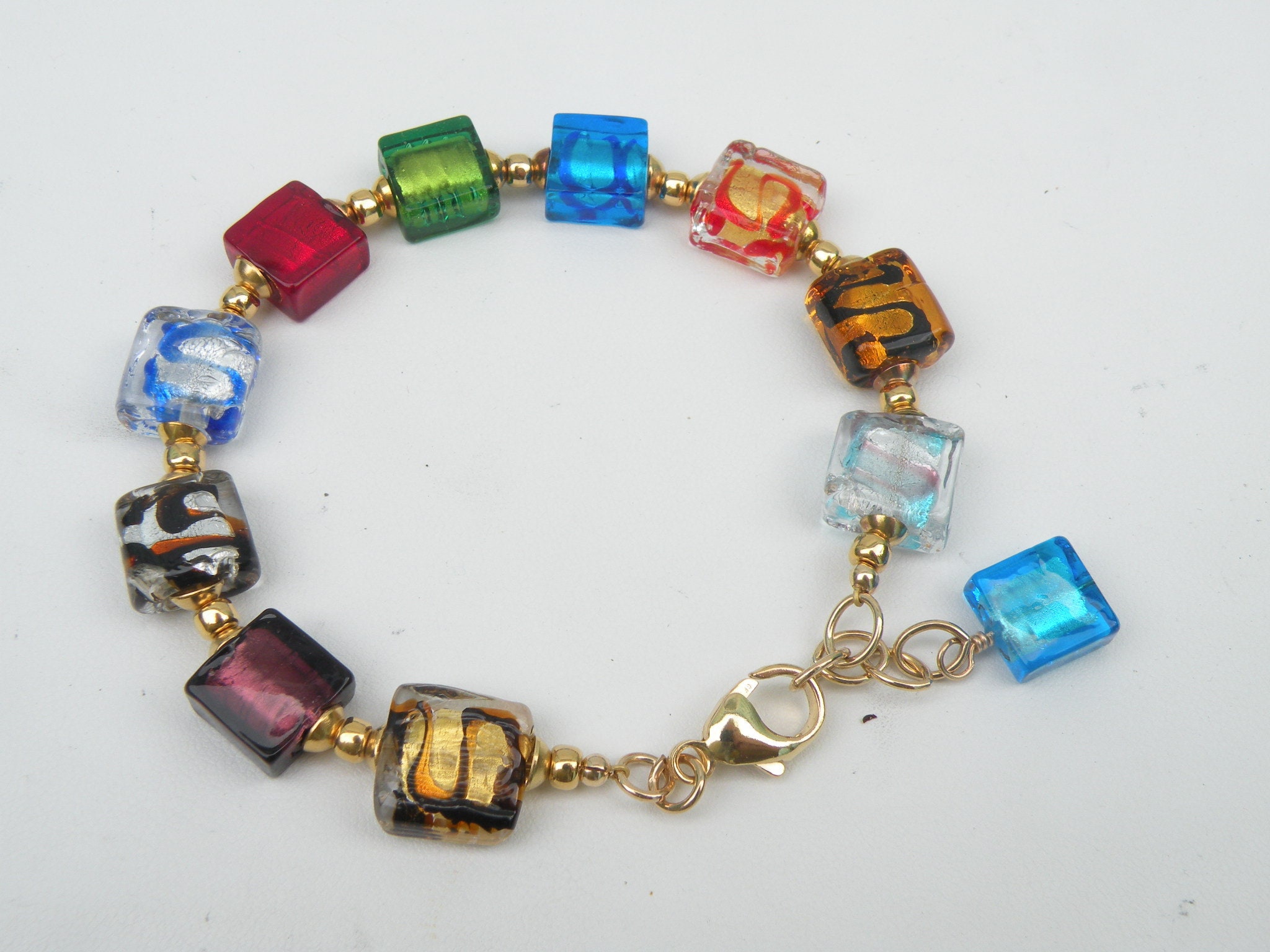Buy Vintage Venetian Murano & Foiled Glass Charm Bracelet Round Links  Toggle Clasp Online in India - Etsy