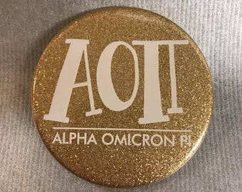 Alpha Omicron Pi Glitter Gold Button or Magnet
