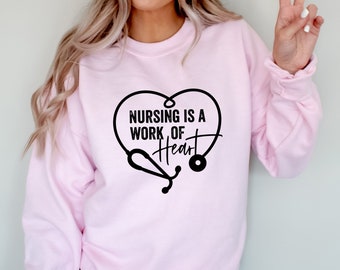 Nursing Is A Work Of Heart Graphic Sweatshirt | Nurse Sweatshirt | Career | Gift for Nurse | Unisex Fit | Women's Sweatshirt | Gildan