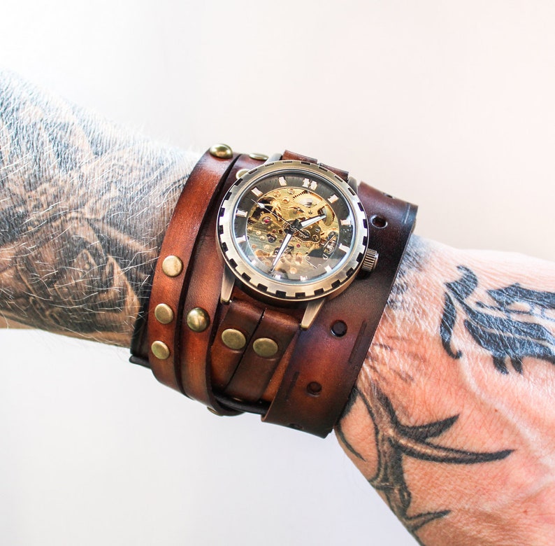Men's leather watch, Steampunk watch. Handmade wide leather cuff wrap watch with antique steampunk watch and rivets.