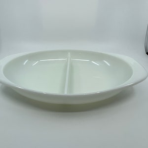 May include: White oval divided serving dish with two sections and two handles.