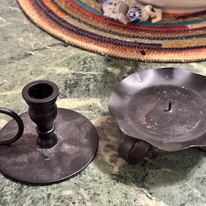 Vintage wrought iron candle stick and candle holder