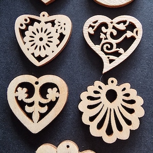 Set mit 3 Holzverzierungen