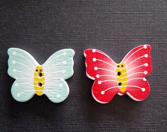 Set aus 4 hölzernen Schmetterlingsknöpfen