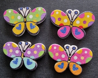 Set aus 4 hölzernen Schmetterlingsknöpfen