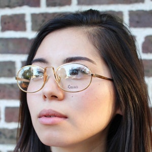 Alain Mikli 90s vintage glasses model 1107 008. Prescription oval eyeglasses in a gold metal frame. Spectacles. Optical frames. Rx NOS