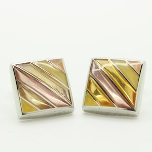 Thomas PInk vintage square cuff links made in England. Solid metal construction with pink and yellow tone enamel curved surface. NOS
