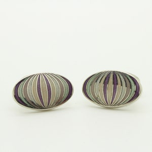 Thomas PInk vintage oval cuff links made in England. Solid metal construction with purple and green tone enamelled 'onion' design. NOS