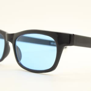 80s vintage rectangular sunglasses. Black wide low profile wayfarer style frame with sky blue lenses. Mens Psychedelic mod. Unused NOS