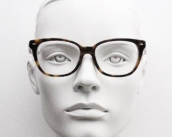 Ray-Ban modified wayfarer eye glasses model 5310F. Dark tortoise acetate optical frame with grey interior. Rayban RX prescription eyeglasses