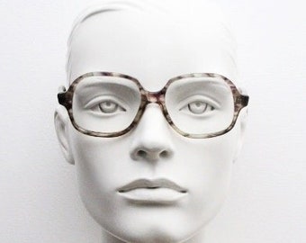 Gafas cuadradas vintage de los años 60. Montura gruesa de acetato gris transparente moteado para hombre. Gafas graduadas.