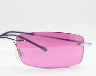 Y2K vintage frameless sunglasses with small pink rectangular lenses and extreme flexi metal arms. 2000s. Unused NOS