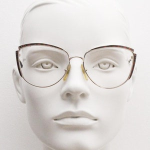 Paloma Picasso 80er Jahre Vintage Brille made in Austria. Elegante übergroße optische Fassungen mit emailliertem Schildkrötenmuster. RX Sehstärke