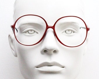 Gafas vintage Metzler de los años 80, modelo 0609, de gran tamaño, fabricadas en Alemania. Montura redonda en rojo y negro. Gafas graduadas.