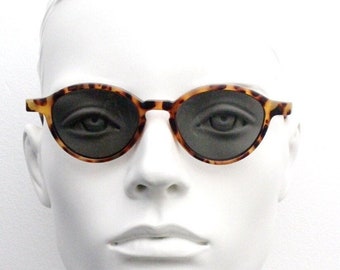 90s vintage cateye sunglasses. Matt tortoise slim 50s style cat eye with wide side joints. Womens NOS cateyes. BNWT