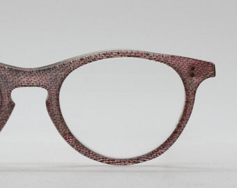 Y2Kヴィンテージの尖ったキャットアイメガネ。べっ甲柄のクリアレンズ