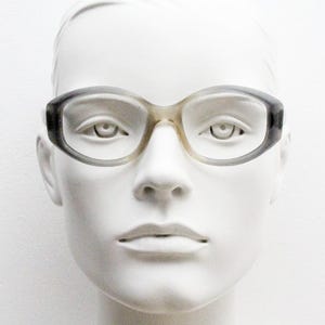 60s vintage angular oval eye glasses made in the UK. Transparent grey ombre acetate optical frames. Womens prescription RX Spectacles