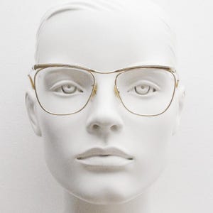 Algha 50s vintage 12K gold filled cat eye glasses made in England. Womens metal brow line optical frame. Prescription RX cateye spectacles