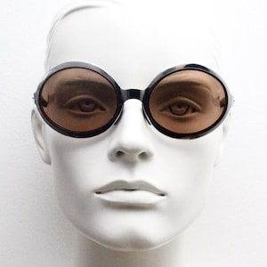 60s vintage silver space age sunglasses. Futuristic era defining oversized mod metal frame with cut out &quot;Elvis&#39; arms. 70s