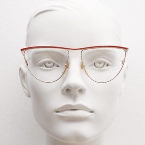 Martin Lunettes 80s vintage eye glasses made in Italy. Stylish gold chrome optical frame with red flat top. Prescription RX spectacles. NOS