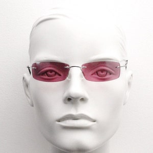 90s vintage frameless sunglasses with small pink rectangular lenses and extreme flexi metal arms. 2000s. Y2K. Unused NOS