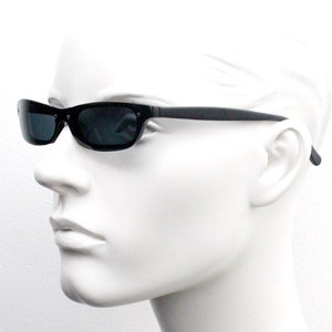 Caroline B.K. 90s Vintage cat eye mini visor sunglasses model 4115 made in Italy. Stylised ultra slim black acetate micro cateye. Unused NOS