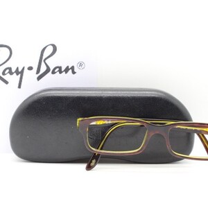Ray-Ban rectangular low profile wayfarer style glasses model 5187. Dark brown slim acetate optical frame. Prescription eyeglasses spectacles