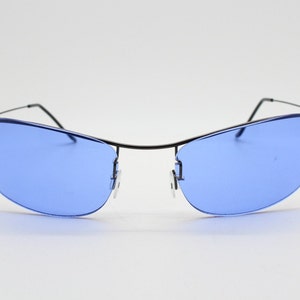 Y2K vintage frameless  sunglasses. Minimalistic sky blue suspended lenses on lightweight gunmetal brow line. 2000s  NOS. BNWT. 90s