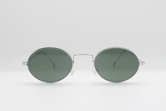 90s vintage oval sunglasses. NOS minimal chrome 2… - image 1