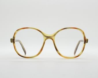 70er Jahre Vintage runde Brille. Geschmackvolle transparente Acetatoptik Fassung in melierten Brauntönen. Korrekte Brille. RX Brille