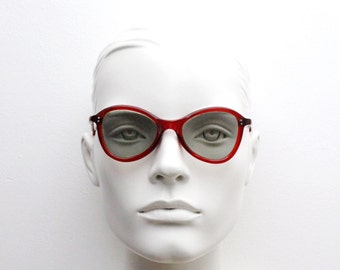 Vintage 40s red sunglasses. Crimson frame with light tone grey real glass lenses. Authentic originals. 30s