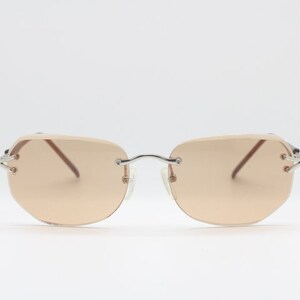 Y2K vintage sunglasses. Frameless light brown bevelled edge lenses with chrome connectors and slender arms. 2000s unused NOS. BNWT image 4