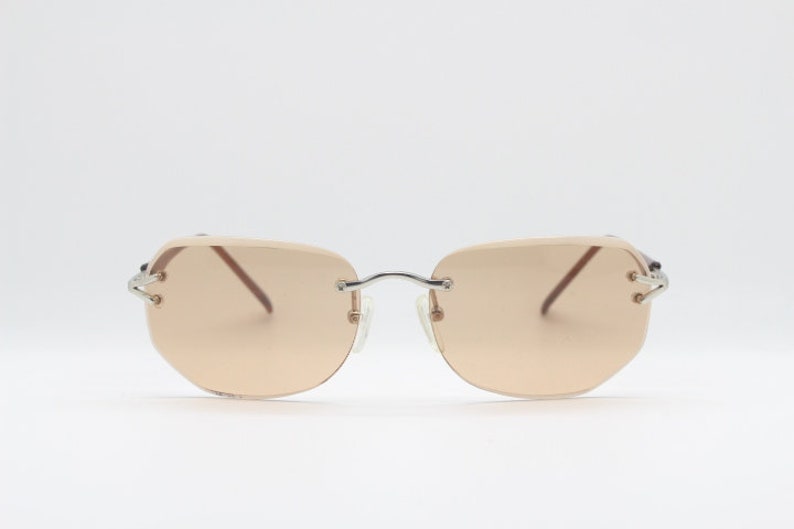 Y2K vintage sunglasses. Frameless light brown bevelled edge lenses with chrome connectors and slender arms. 2000s unused NOS. BNWT image 4