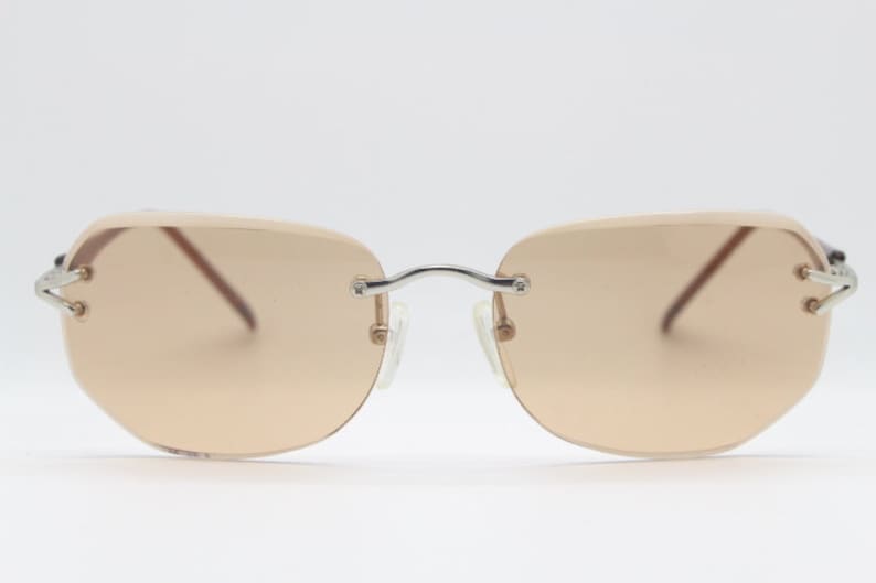 Y2K vintage sunglasses. Frameless light brown bevelled edge lenses with chrome connectors and slender arms. 2000s unused NOS. BNWT image 5