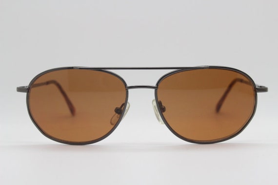90's small aviator sunglasses. Original NOS square metal frame aviators with brown lenses. NWT. Teardrop. Mens womens aviators. The General. 90's small aviator sunglasses. Original NOS square metal frame aviators with brown lenses. NWT. Teardrop. Mens womens aviators. The General.