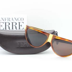 Gianfranco Ferre 90s vintage sunglasses model 26 405 made in Italy. Mottled brown acetate flat top with gold arms and brown lenses