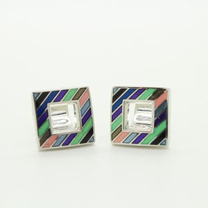 Thomas PInk vintage square cuff links made in England. Steel construction with cut out centre and multi colour enamel diagonal stripes. NOS