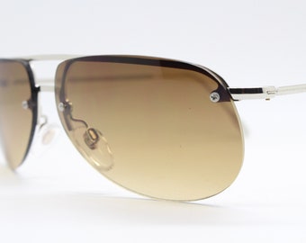90s vintage modified aviator sunglasses. Metal half frame with brown graduated cutaway lenses. Mens aviators. Unused NOS
