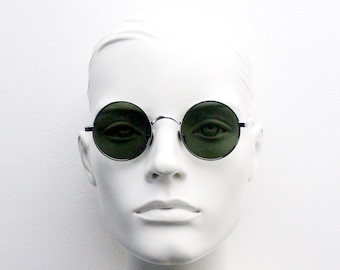 90's vintage round sunglasses. Bright chrome 20s style frame with flat arms and green lenses. BNWT. Unused NOS