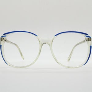 70s vintage oversized square eye glasses. Stylised clear acetate optical frame with blue outline. Womens prescription eyeglasses. RX. 80s