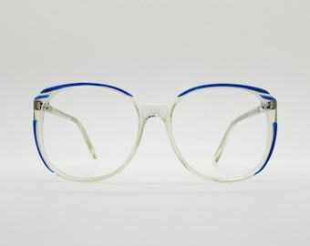 Gafas cuadradas extragrandes vintage de los años 70. Montura de acetato transparente estilizada con contorno azul. Gafas graduadas para mujer. RX. Años 80.