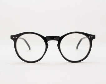 Black round Y2K glasses. 40s, 50s style optical frames with clear lenses. Prescription eyeglasses. O Malley spectacles