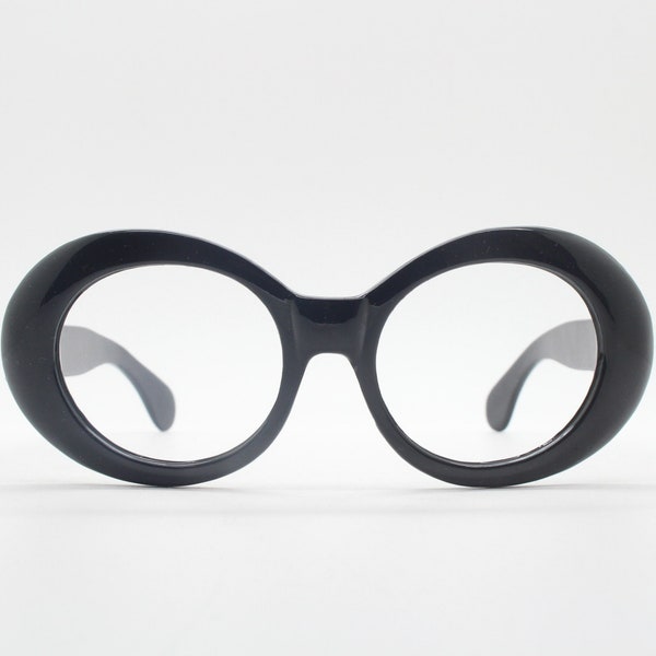 90er Jahre Vintage große runde Brille. 60er Jahre Mod Design verdickter schwarzer Rahmen in Ellipsenoptik. Korrekte Brille. RX Brille