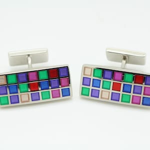 Vintage rectangular cuff links made in England by Berend De Witt. Solid metal construction with vibrant multi coloured mosaic. NOS