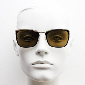 Vintage 50s rectangular sunglasses. Classical period design in slender gold browline and black acetate frame with real glass lenses. Beatnik