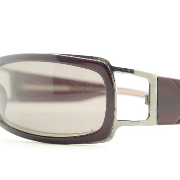 90s vintage wrap around sunglasses. Deep chestnut brown low profile shield design with check pattern arms. 2000s