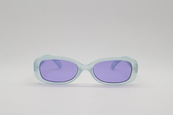 Kid's Y2K vintage sunglasses. Transparent frosted