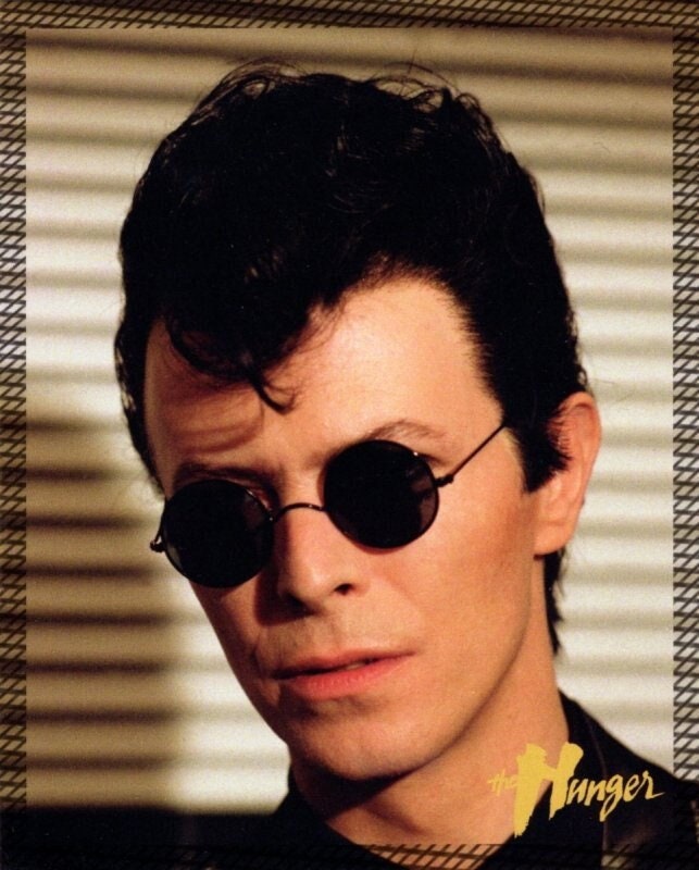 90s round vintage sunglasses. Small black gloss 20's style metal frame with black lenses. John Lennon. 80s