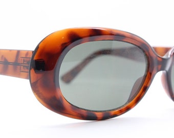 90s vintage oval sunglasses. Chunky tortoise 60's mod style frame with green lenses. Unused NOS